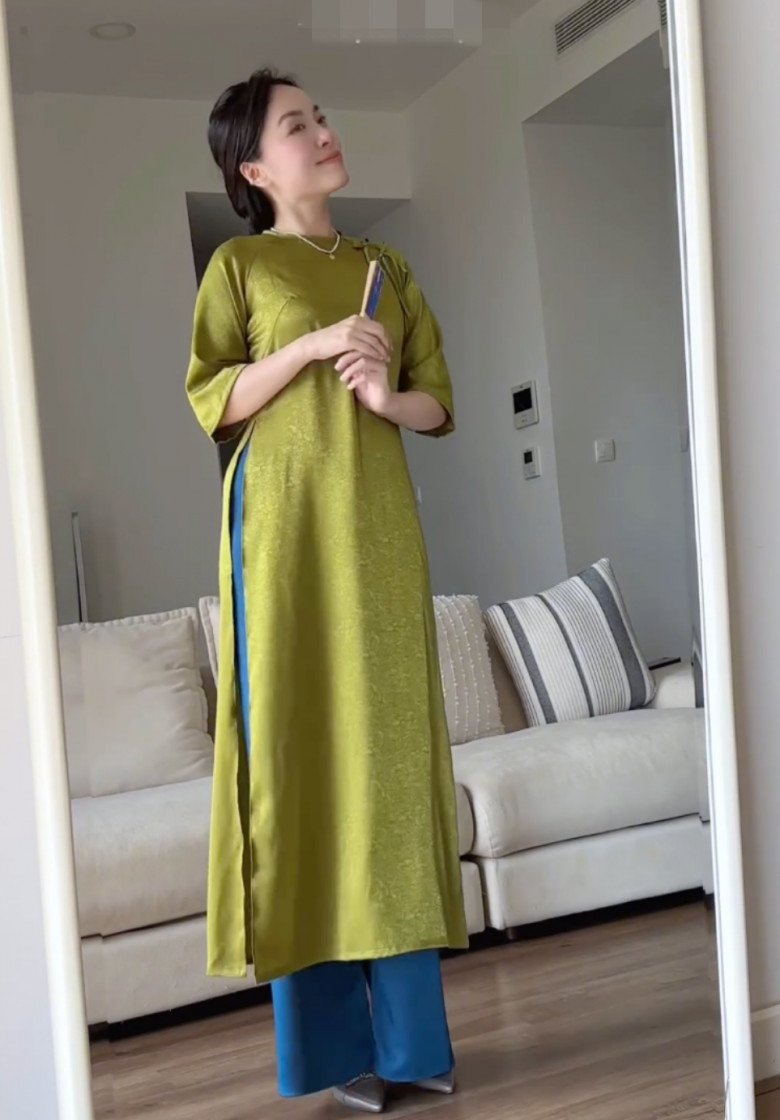 Bạn gái cơ trưởng trẻ nhất Việt Nam xúng xính hơn chục bộ áo dài đón Tết, vừa hợp mệnh vừa khéo tôn dáng - 3