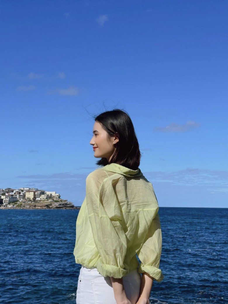 Ở Úc vẫn nhớ Tết Việt, hoa hậu Ý Nhi diện áo dài xuống phố - 11
