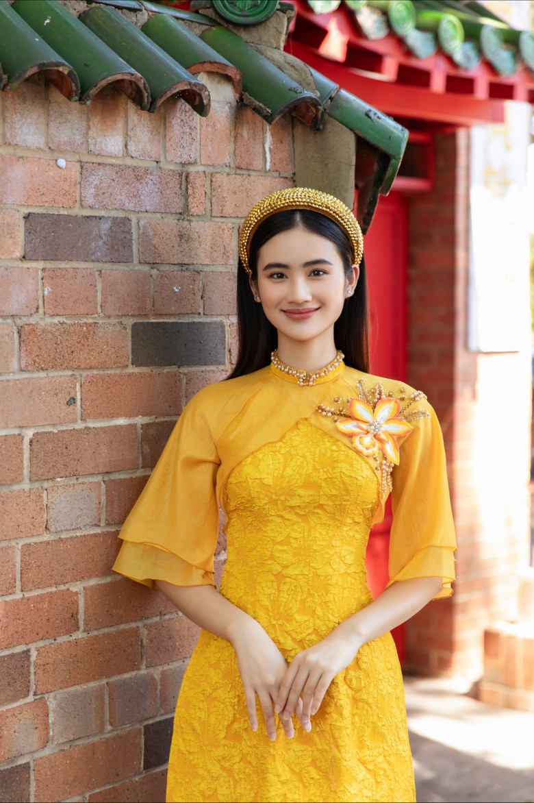 Ở Úc vẫn nhớ Tết Việt, hoa hậu Ý Nhi diện áo dài xuống phố - 7