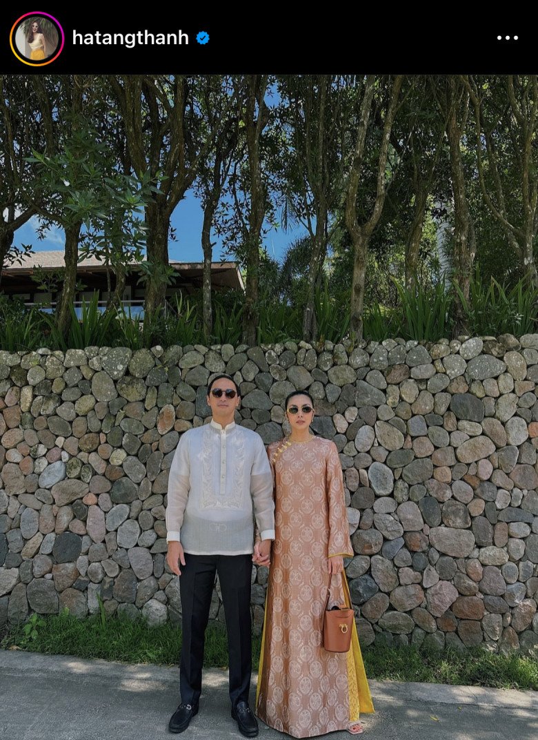 Vợ chồng Tăng Thanh Hà đi ăn cưới: Vợ &#34;chung tình&#34; với áo dài Việt, chồng mặc trang phục Philippines - 1