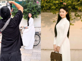 Con gái Quyền Linh diện áo dài xuống phố được du khách Tây vây kín ngắm nhìn, sắc vóc tuổi 20 trong veo