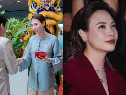 Phu nhân chủ tịch Cường Đô La phát lì xì đầu năm, cao hơn hẳn mọi người một cái đầu, 2 nhóc tì gây chú ý