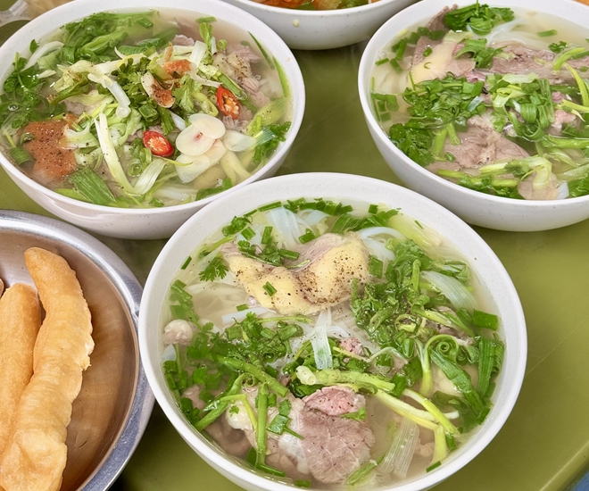 4 quán ngon mở cửa xuyên Tết ở Hà Nội, toàn đặc sản giải ngấy chỉ vài chục nghìn, có nơi không phụ thu  - 1