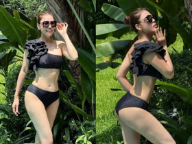 Á hậu mua giải 600 triệu diện bikini o ép vòng một căng tràn, sinh 3 con vẫn mê mặc "thiếu vải" khoe dáng nuột nà