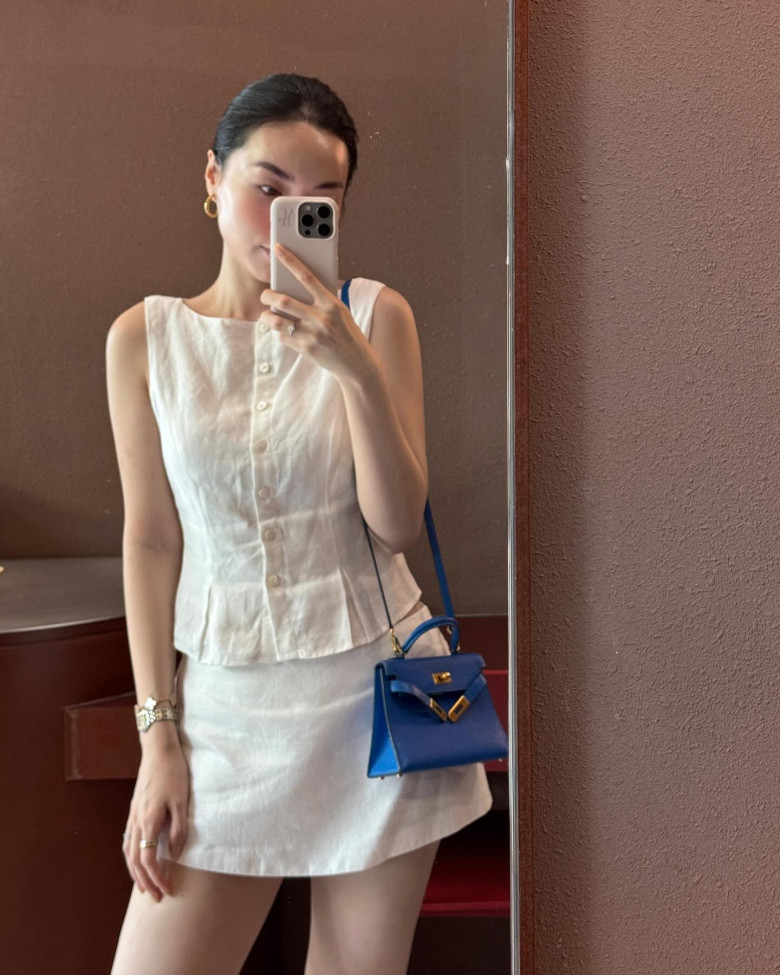 Vợ cơ trưởng “trẻ nhất Việt Nam” chỉ mặc đồ đen trắng mà trông sang đẹp như người mẫu nhờ công thức &#34;hack dáng&#34; cực ngọt - 13