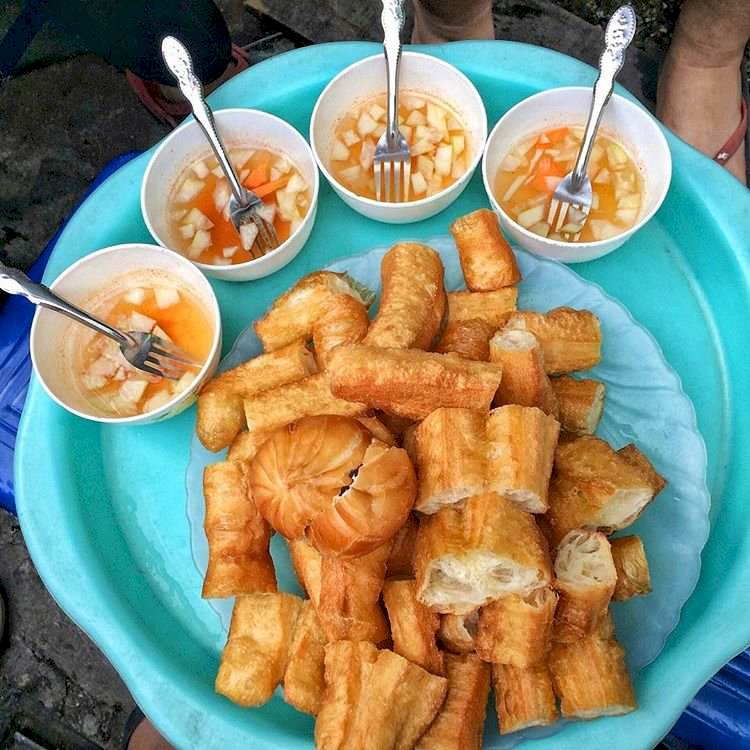 Ăn gì ở Hà Nội ngày mưa gió? Mách bạn những món ngon lề đường nóng hổi, tín đồ ăn cay không thể bỏ qua - 3